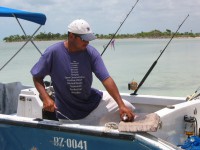 Our guide is preparing a delicious beach BBQ!